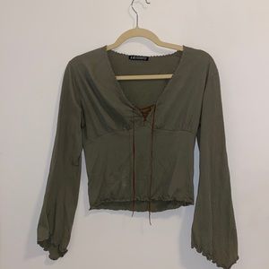Green tied long sleeve top